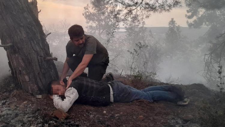 Ormandaki yangında yerde yatarken bulundu; Isınmak amacıyla yaktım dedi