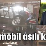 Otomobil asılı kaldı