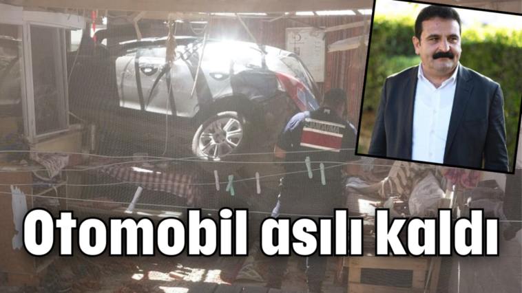 Otomobil asılı kaldı