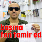 Tek başına telefon tamir ediyor