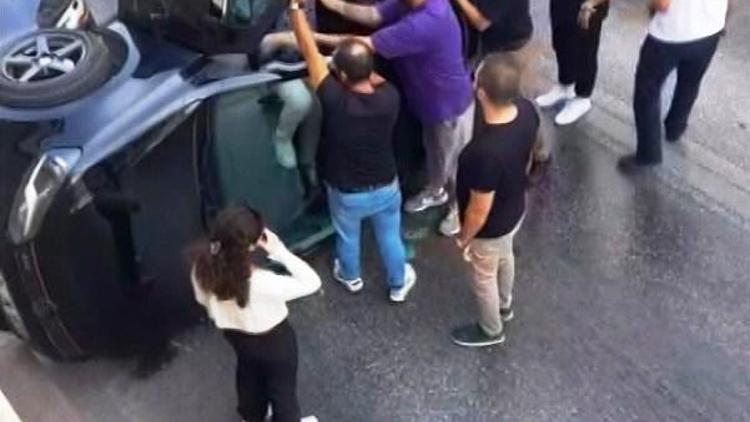 Takla atan otomobilden burnu kanamadan çıktı