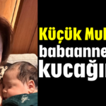 Küçük Muhittin babaannesinin kucağında