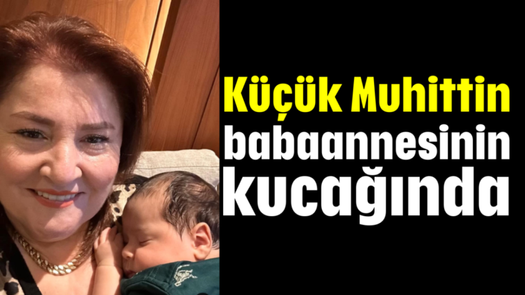 Küçük Muhittin babaannesinin kucağında