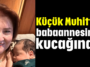 Küçük Muhittin babaannesinin kucağında