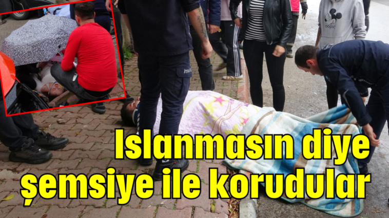 Islanmasın diye şemsiye ile korudular